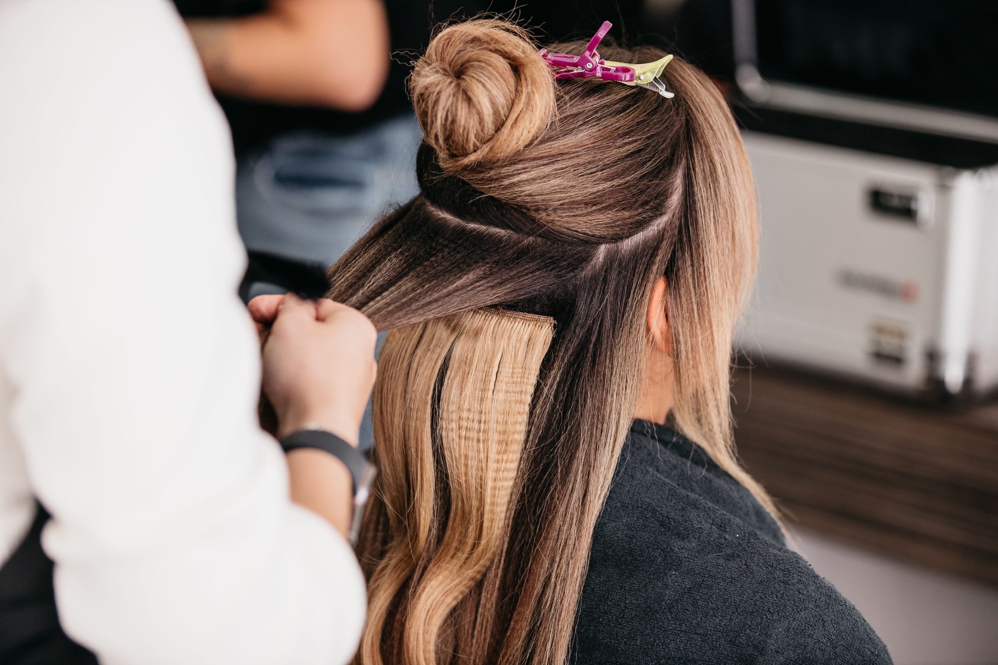 young-female-with-long-wavy-hair-styling
